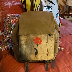 Computer backpack w/banksy design. Never used.